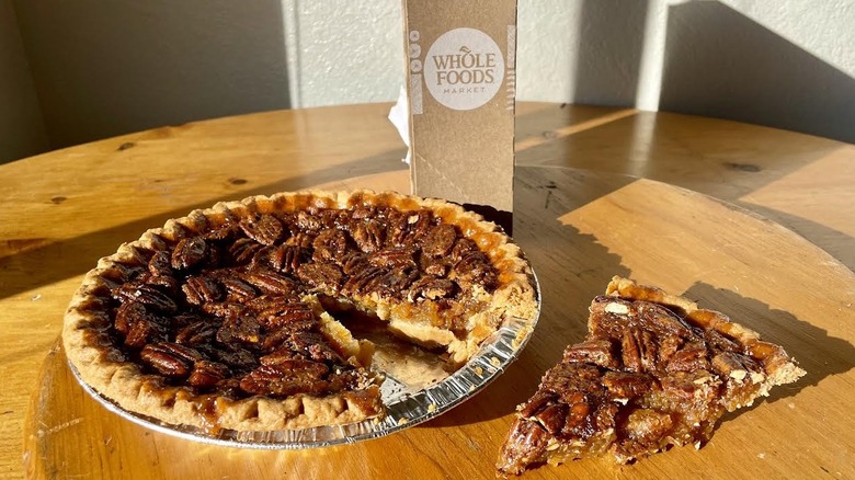 Whole Foods Market Pecan Pie with a slice taken out