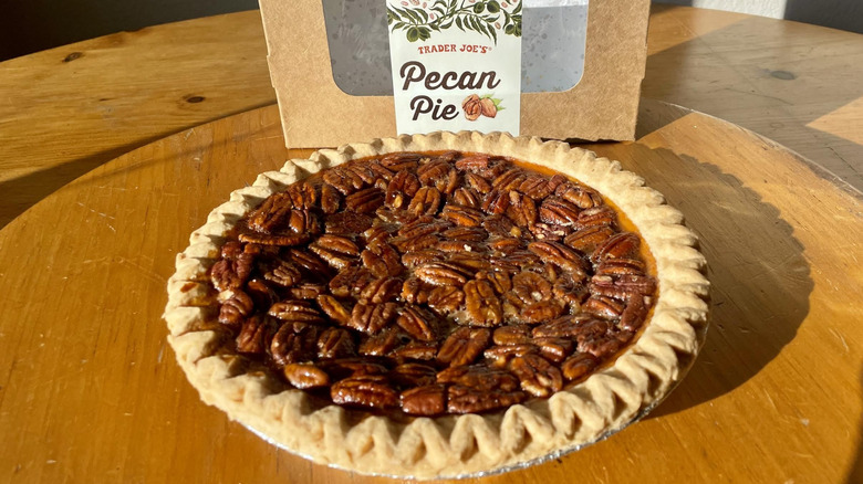 Trader Joe's Pecan Pie with box on wooden table