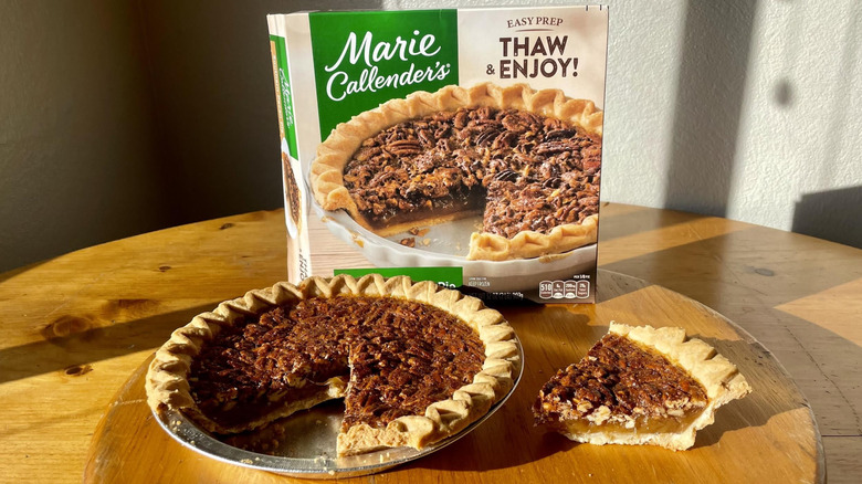 Marie Callender's Southern Pecan Pie with box with and a slice taken out