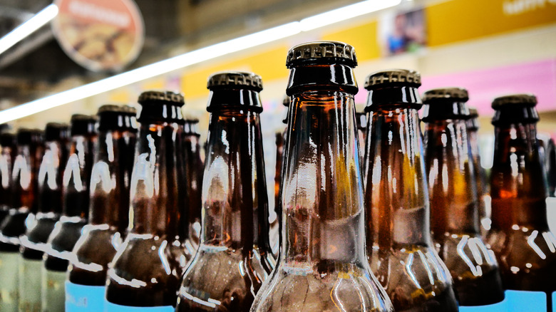 Rows of beer bottles on the line in a factory