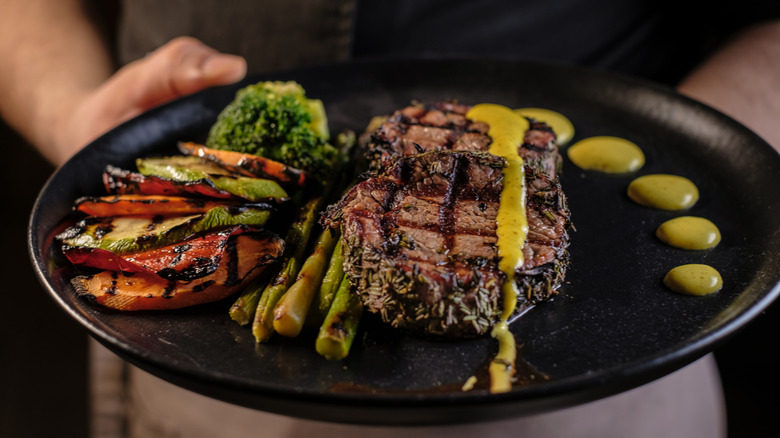 Steak with vegetables and sauce