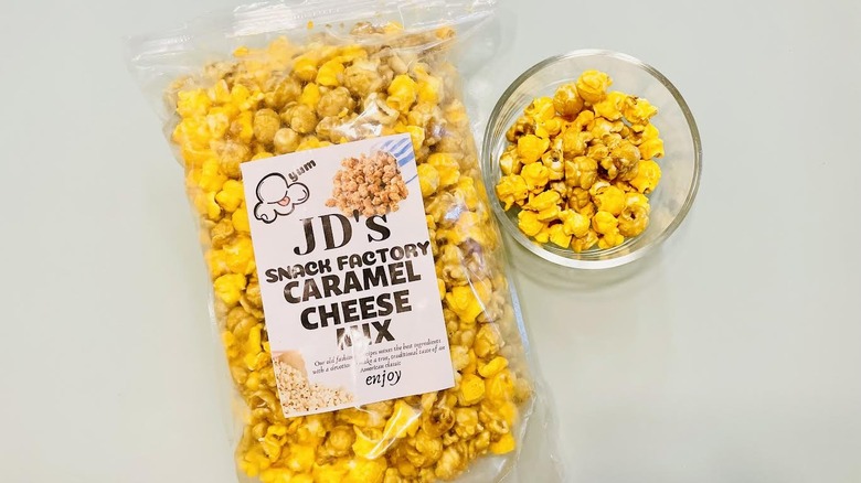 Bag and dish of JD's Snack Factory popcorn