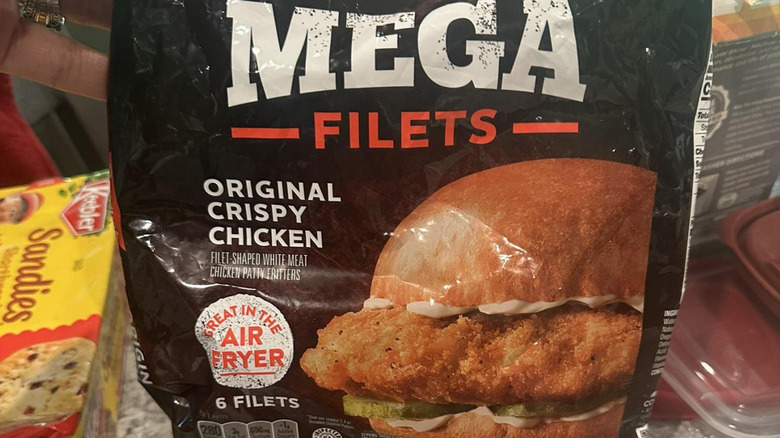 Bag of Banquet Mega Filets Original Crispy Chicken on a kitchen counter.