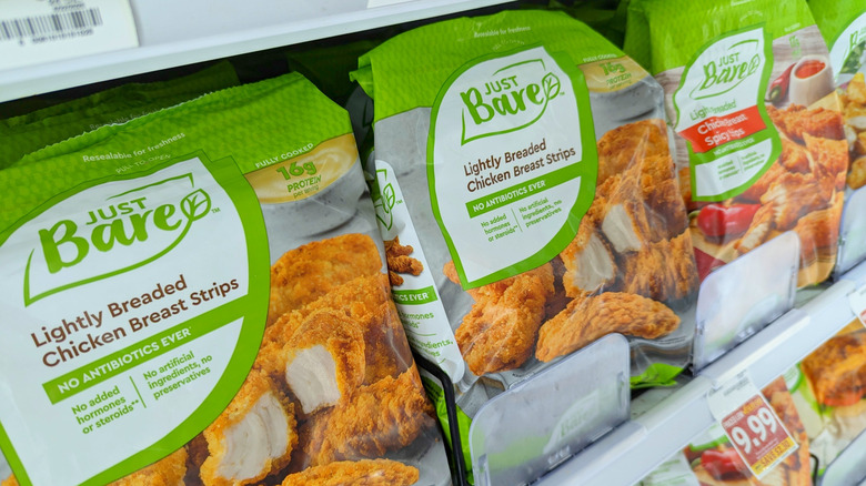 Packages of Just Bare breaded chicken in grocery freezer