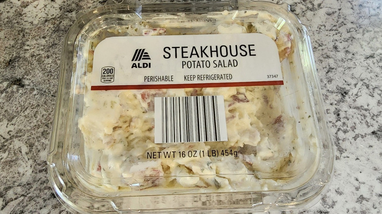 Aldi Steakhouse Potato Salad sitting in an unopened container.