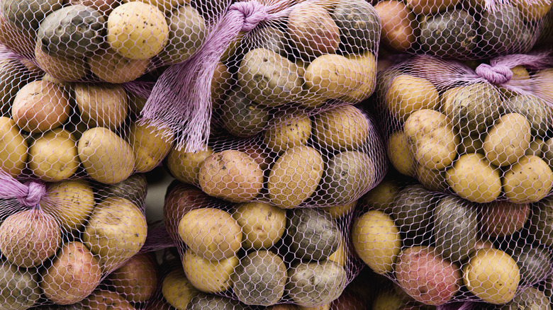 mesh bags of new potatoes