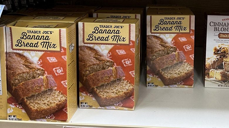 Rows of Trader Joe's Banana Bread Mix sit on the store's shelves