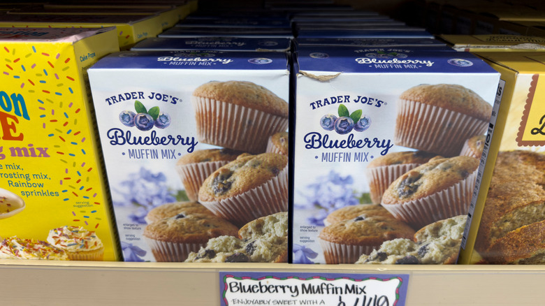 Rows of Trader Joe's Blueberry Muffin Mix sit on the store's shelves