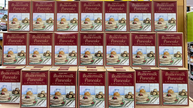 A display of stacked Trader Joe's Buttermilk Pancake & All Purpose Baking Mix sits in the store
