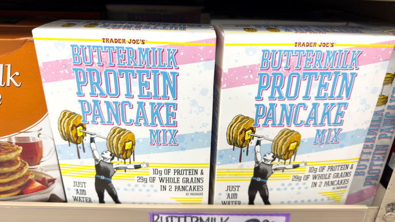 Rows of Trader Joe's Buttermilk Protein Pancake Mix sit on the store's shelves