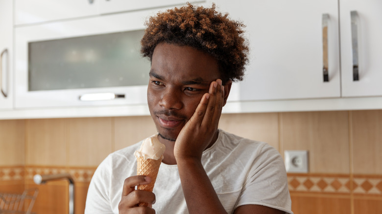 man disappointed with quality of ice cream