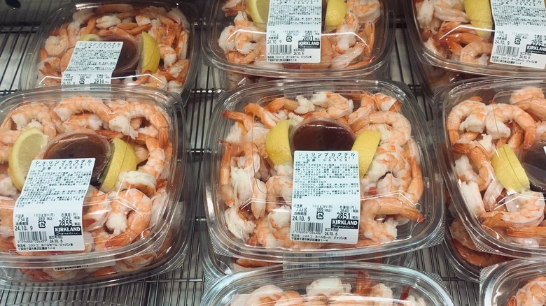 Shrimp cocktail trays in cooler