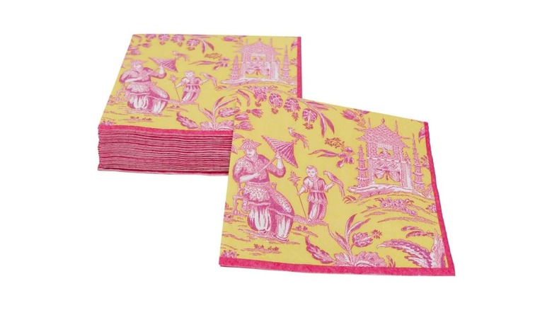 Crimson and gold napkins with silk road imagery