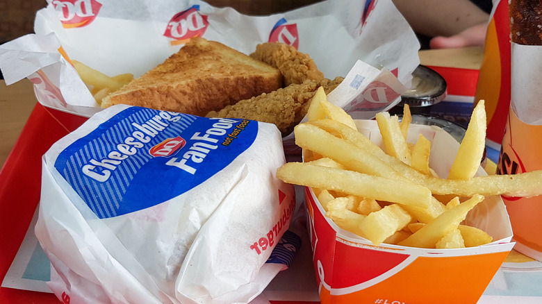 fries, cheeseburger, chicken tenders, and toast