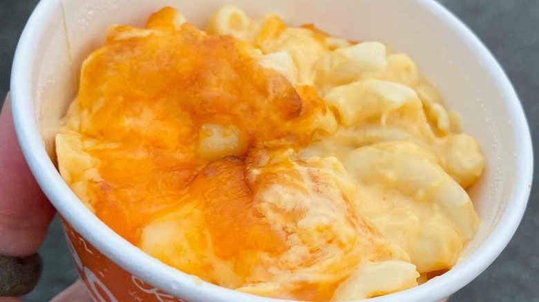 close up of popeyes mac and cheese with melted cheese top
