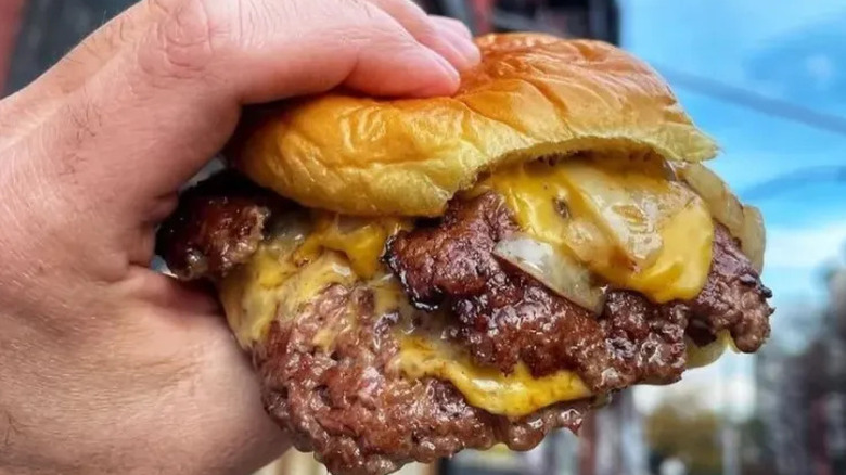7th Street Burger held in a hand