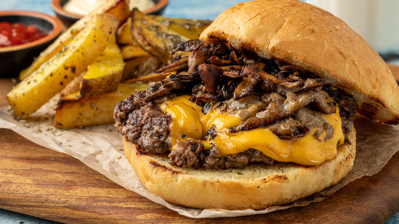 Smashed burger with onions and fries