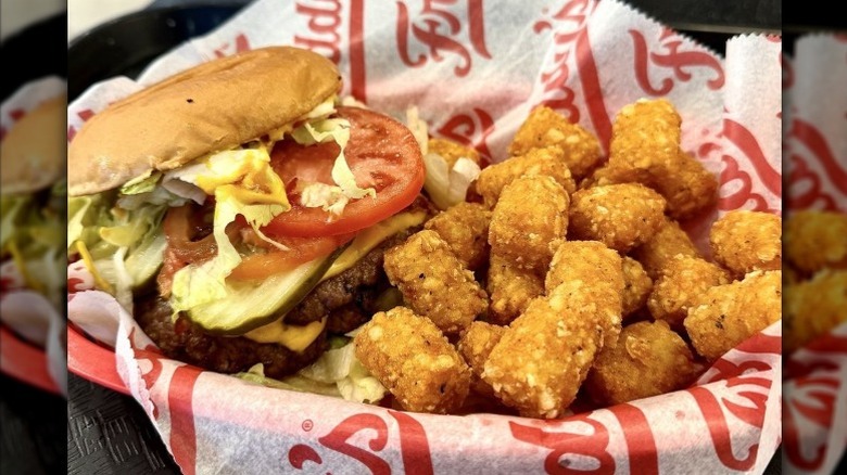 Closeup of a burger and tots at Freddy's