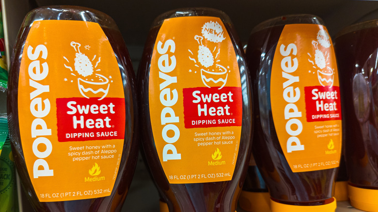 Bottles of Popeyes Sweet Heat Dipping Sauce