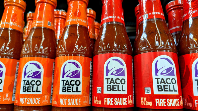 Bottles of Taco Bell sauce in Hot and Fire variety
