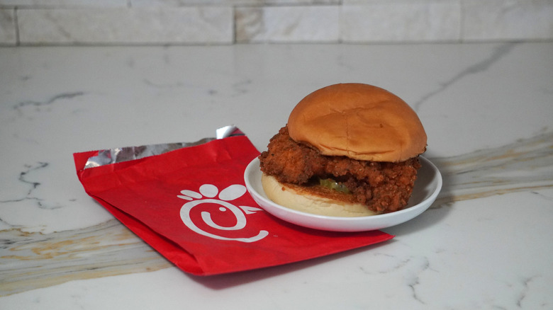 Chick-fil-A Spicy Chicken Sandwich on a red Chick-fil-A bag.