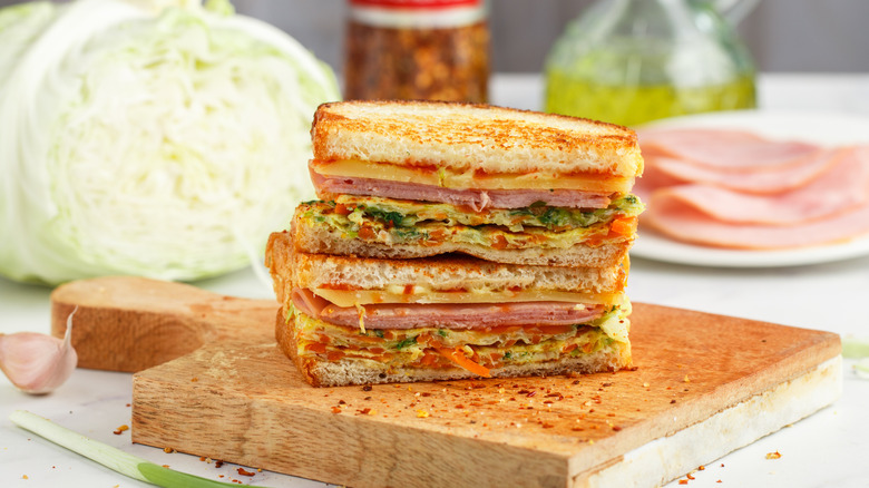 Cross section of Korean street toast on a cutting board
