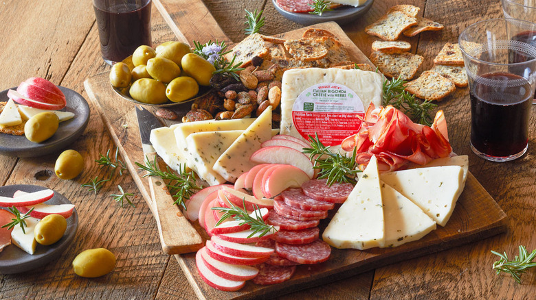 Italian Bigonda Cheese with Herbs from Trader Joe's on a charcuterie board