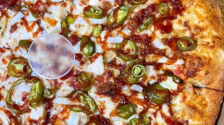 Close-up of a pepperoni, mushroom, and onion pizza from Marco's Pizza