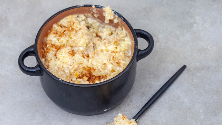 tapioca pudding in a small black pot