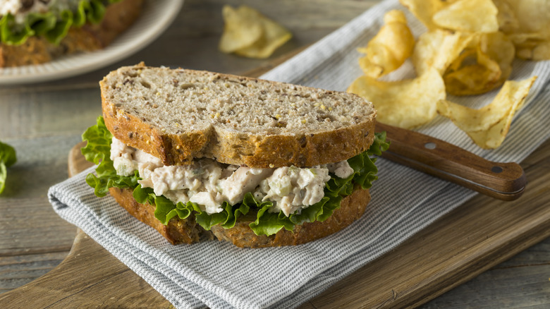 a healthy chicken salad sandwich with chips