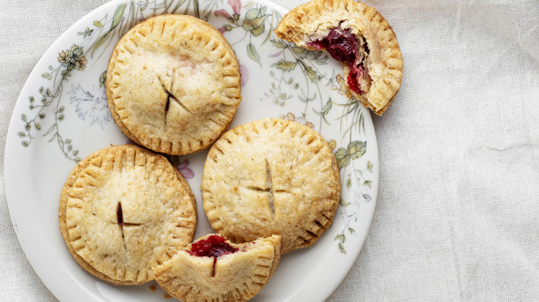 a plate of small fruit hand pies