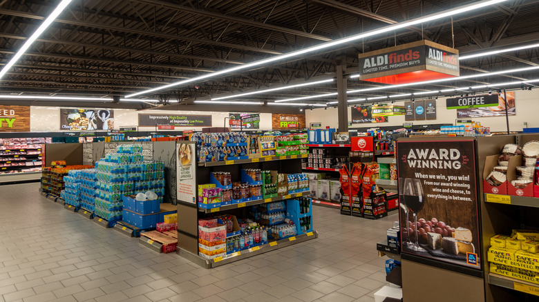 The interior of an Aldi grocery store with empty snack aisles