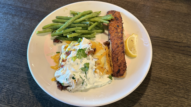 Applebee's Blackened Cajun salmon with green beans and loaded mashed potatoes