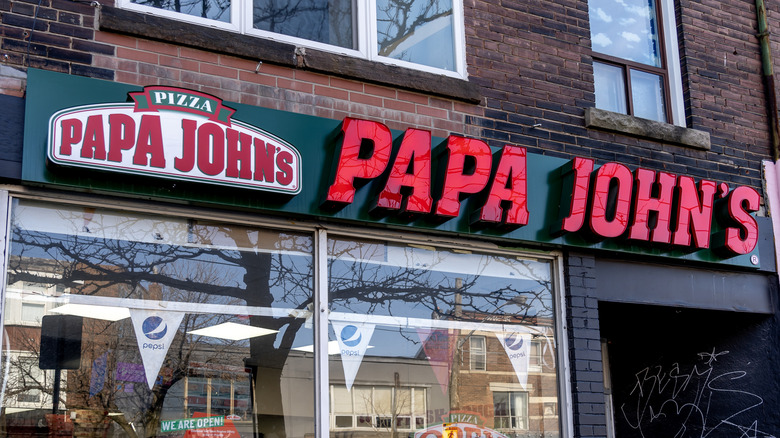 The exterior of a Papa John's pizza restaurant
