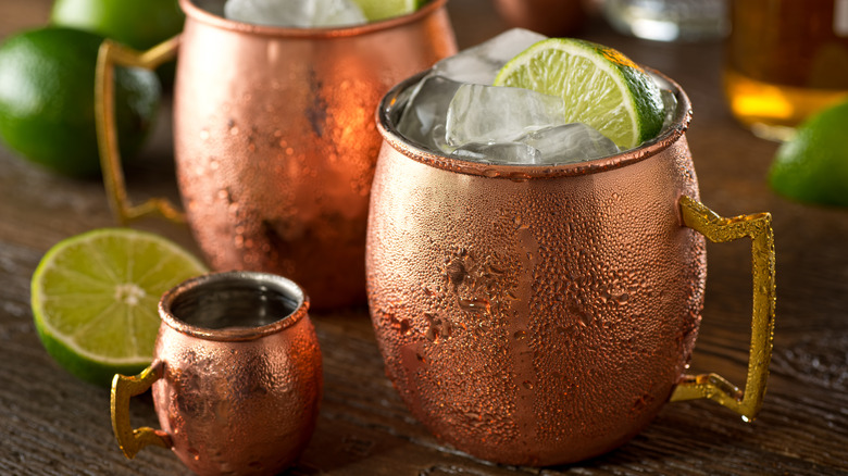 Moscow mule cocktails in cold copper mugs