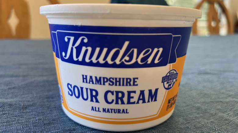 Container of Knudsen sour cream