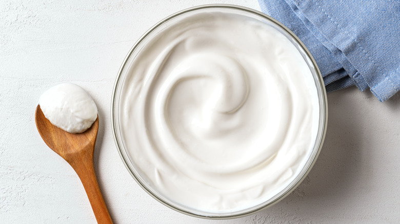 Bowl of sour cream with spoon