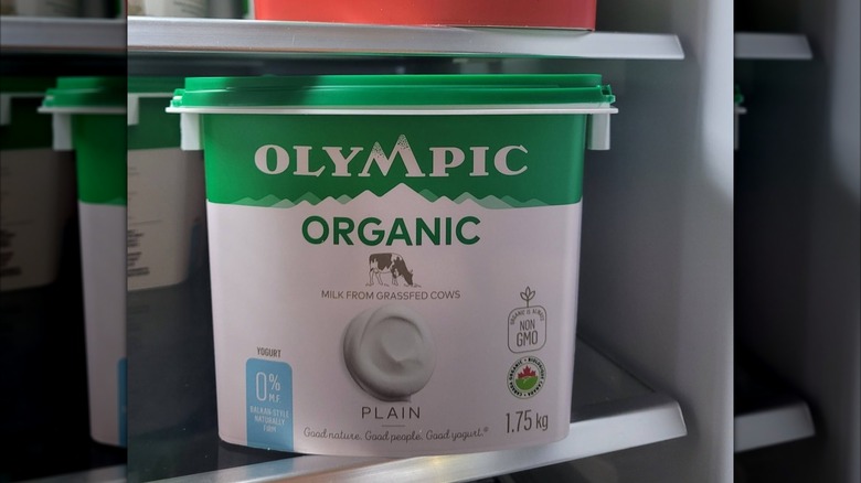 Container of Olympic Organic sour cream