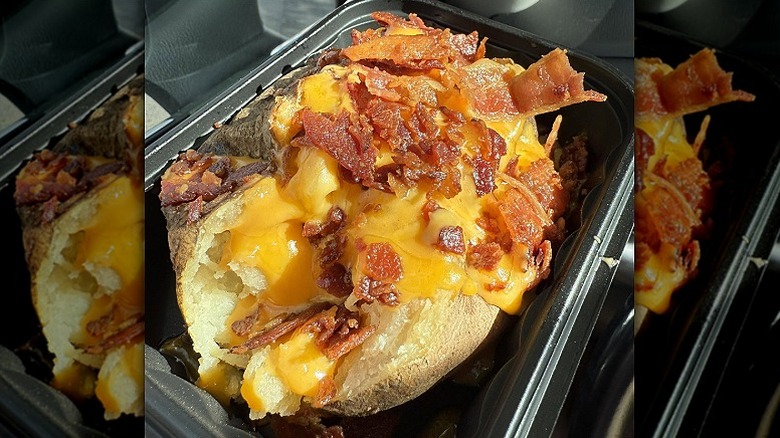 Closeup of a loaded Wendy's baked potato