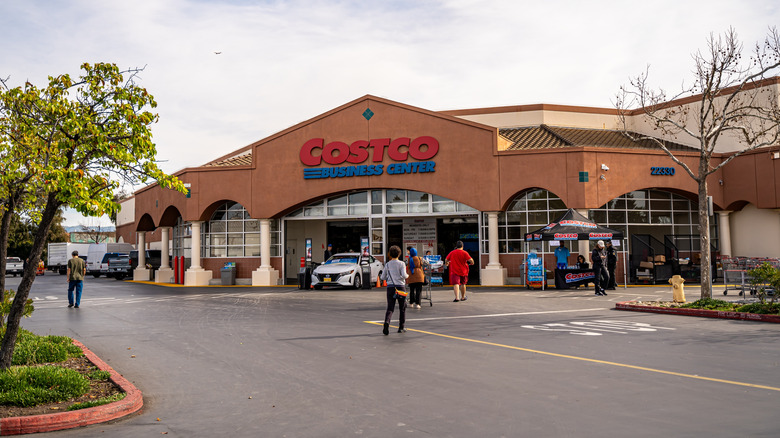 Exterior of a Costco Business Center with customers filing in and out