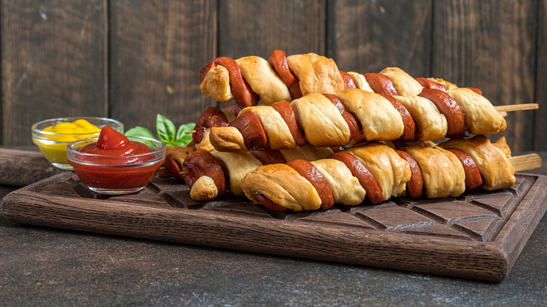 Spiral-cut tornado hot dogs with ketchup and mustard