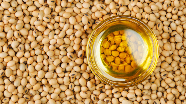 A glass bowl of soybean oil.