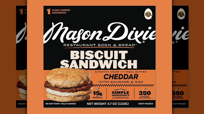 A box of Mason Dixie Cheddar Biscuit Sandwiches with Sausage & Egg