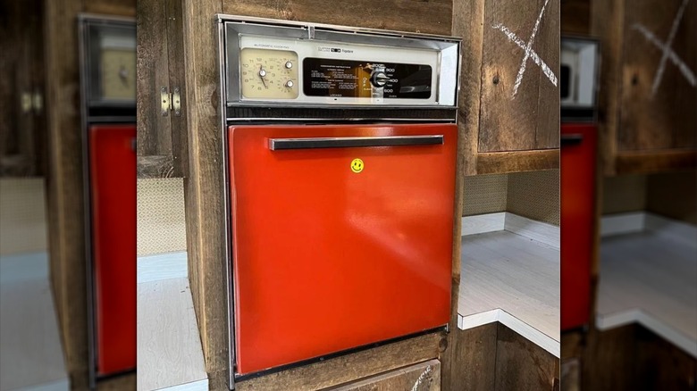 A retro Frigidaire wall oven in Poppy Red