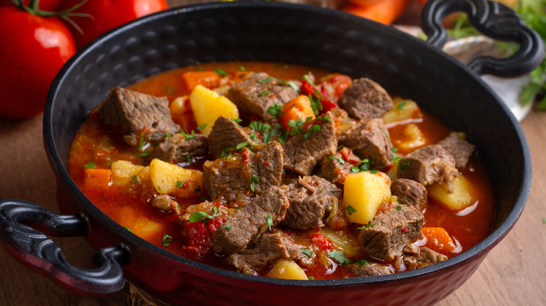 soup or stew with large chunks of beef and potatoes