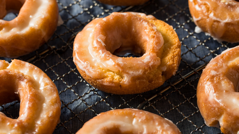 old fashioned donuts with glaze on wire rack