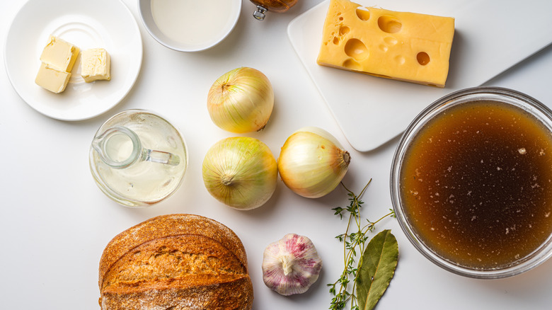 French onion soup ingredients, including onions, beef stock, and cheese