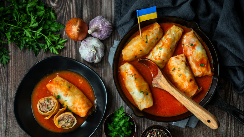 Holubtsi in tomato sauce in black skillet