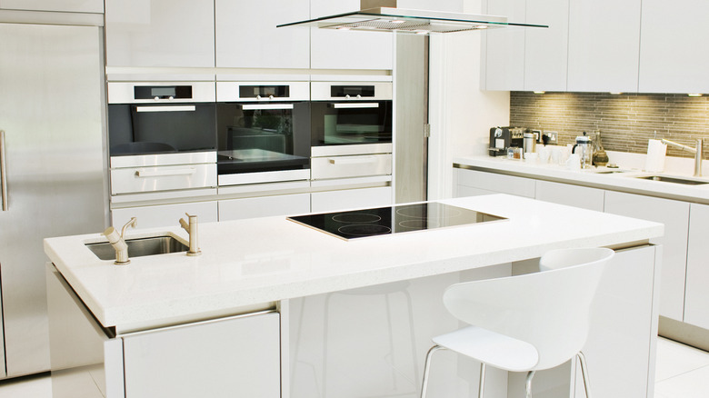 White kitchen counters with white cabinets