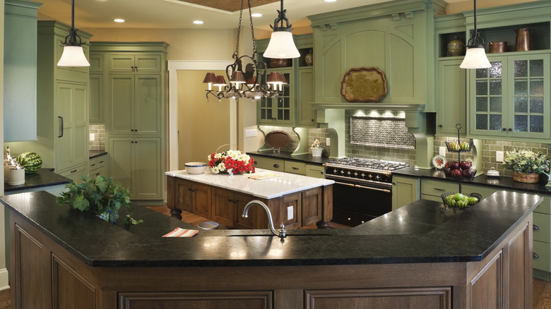 Dark soapstone countertops in a traditional kitchen